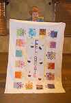 Mary Jo Bergland made this quilt out of the blotto blocks she won