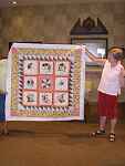 A baby quilt made by Andrea Lasek