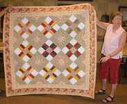 Andrea had enough blotto blocks to make two quilts in different color ways