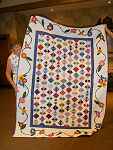 Eileen Powers four patch quilt