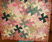 This quilt is called square dance, and was taught by Barbara Hill
