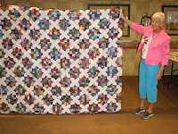 A pieced quilt by Mitzi Evansted