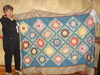 Mary Frost's shooting star quilt that we learned how to do at the retreat