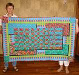 Same quilt but with Kristen in the picture