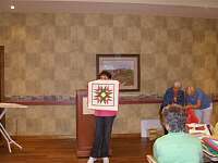 A small wall hanging by Marilyn Crosby