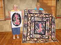 Margo McClary and Alice Bessler show their geisha girl quilts.
