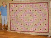 A log cabin quilt by Lorene Gruber