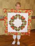 Joanne Reese has finished her log cabin wreath.