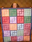 A colorful quilt by Ilga Pivetz
