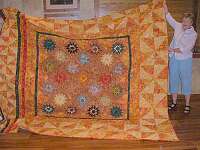 Pam Healy has turned her shooting stars into a king size quilt
