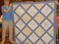 An embroidered quilt by Nancy Smith