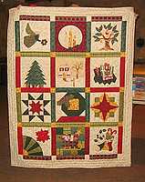 Gae showing Christmas Quilt