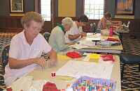 Members of The Quilting Guild of The Villages enjoy an applique class taught by Mary Sorenson