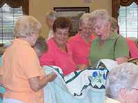 Sue showing here quilt