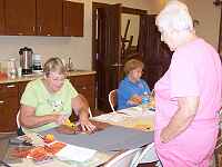 Sandie is working on her pumpkin table runner