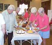 The ladies enjoying the snacks served by The B's.